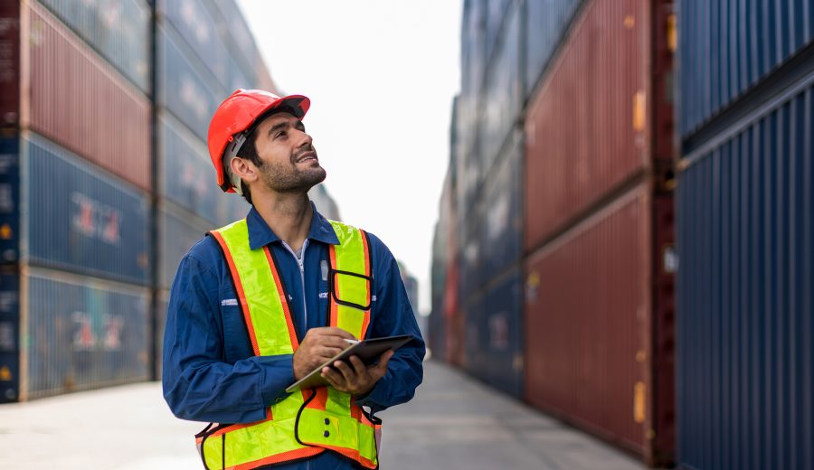 Foreman Or Worker Work At Container Cargo Site Check Up Goods In
