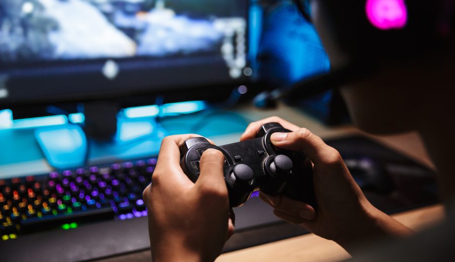 shipping container converion- boy playing video games